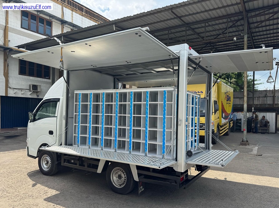 MOBIL MBG ISUZU TRAGA BOX